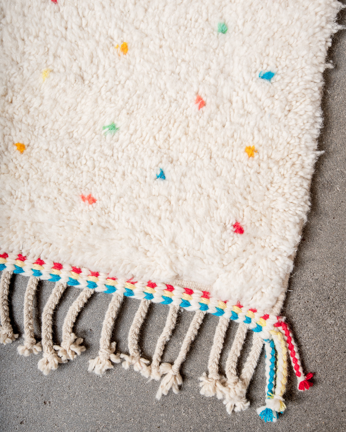 Modern, designer, handcrafted Berber rug from Morocco. Beniourain carpet with beautiful colours and patterns and fluffy wool texture.